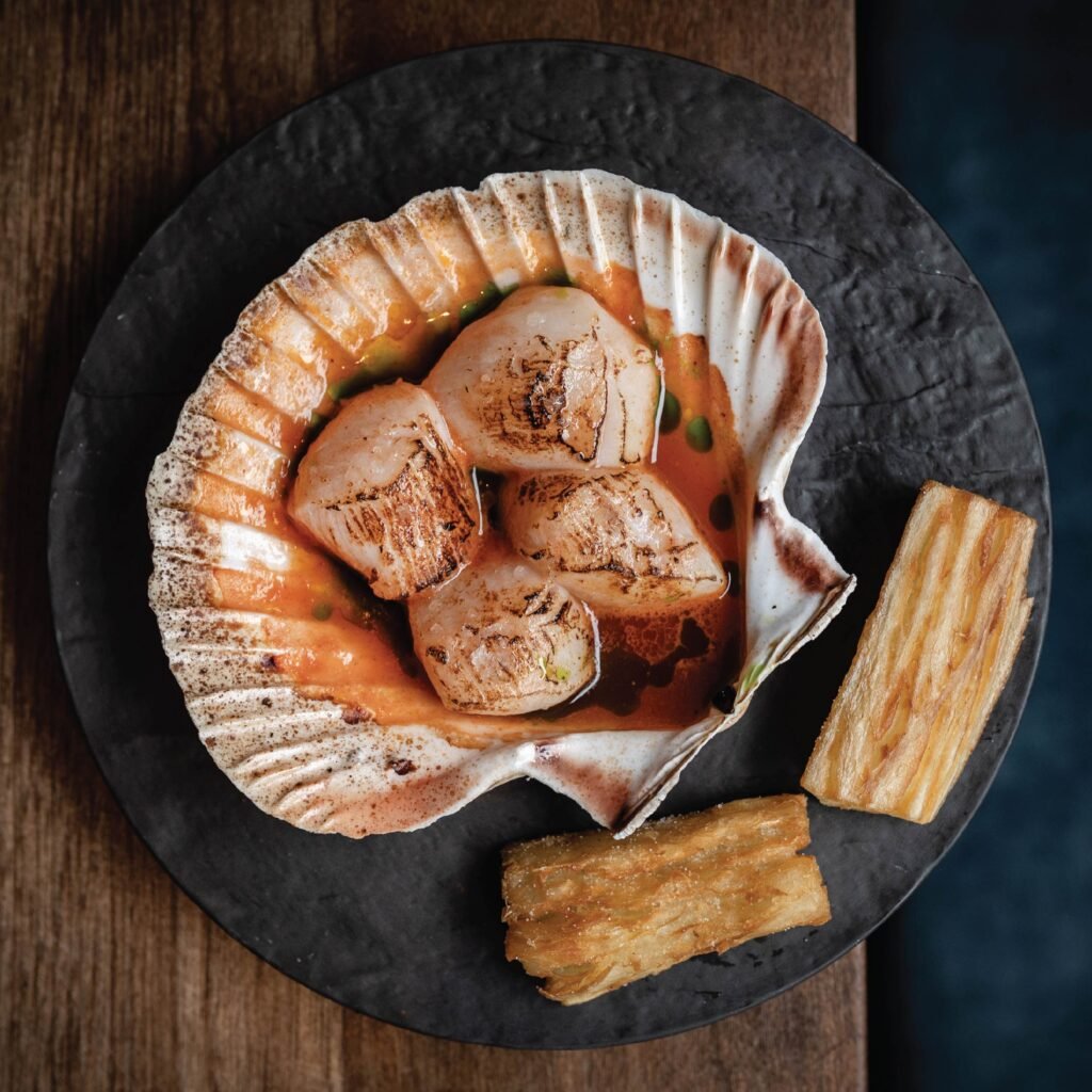 Scallop dish served in its shell